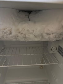 Ice build up in refrigerator so door wouldn’t close all the way on