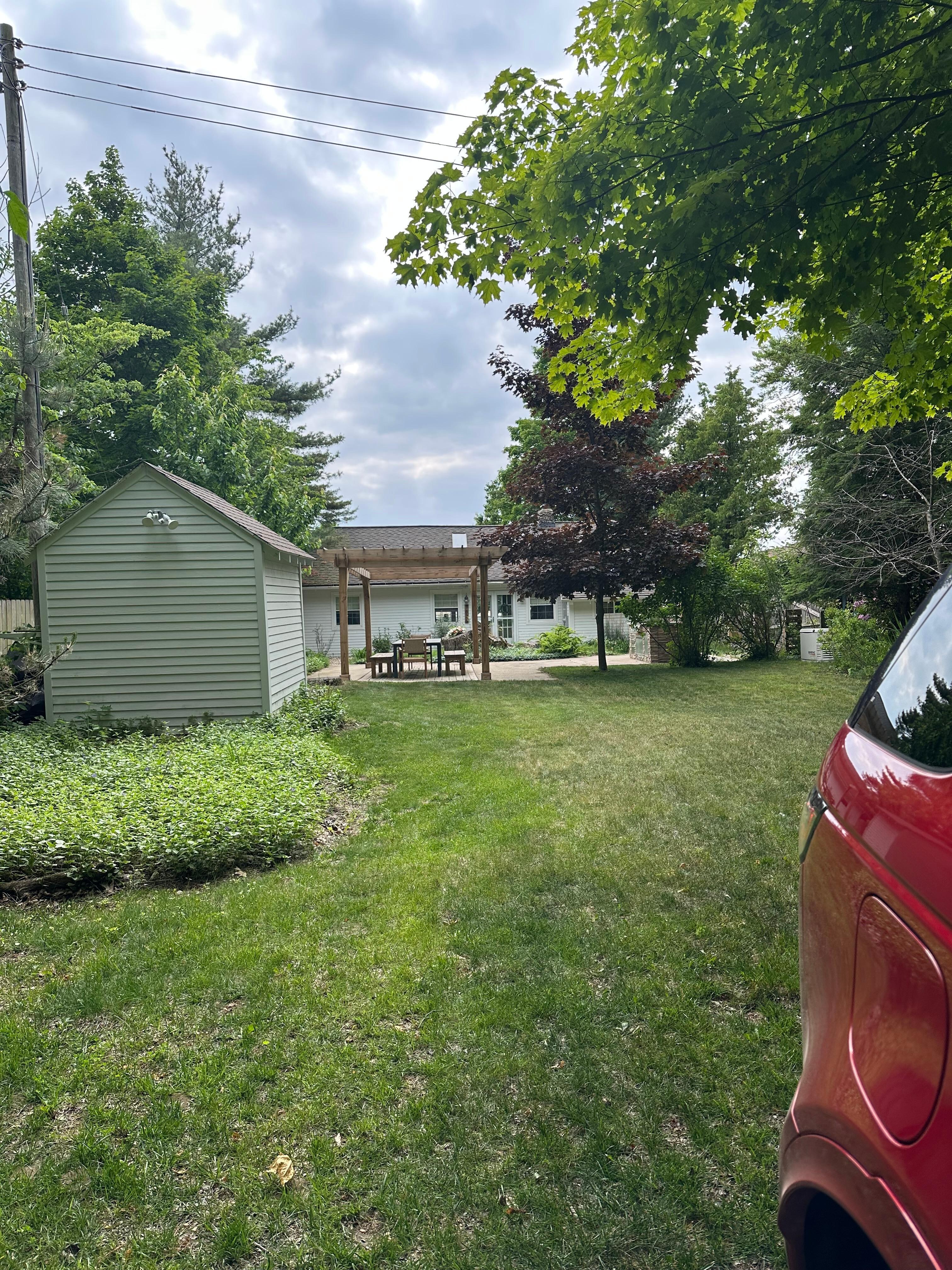 Cute pergola and grill area.