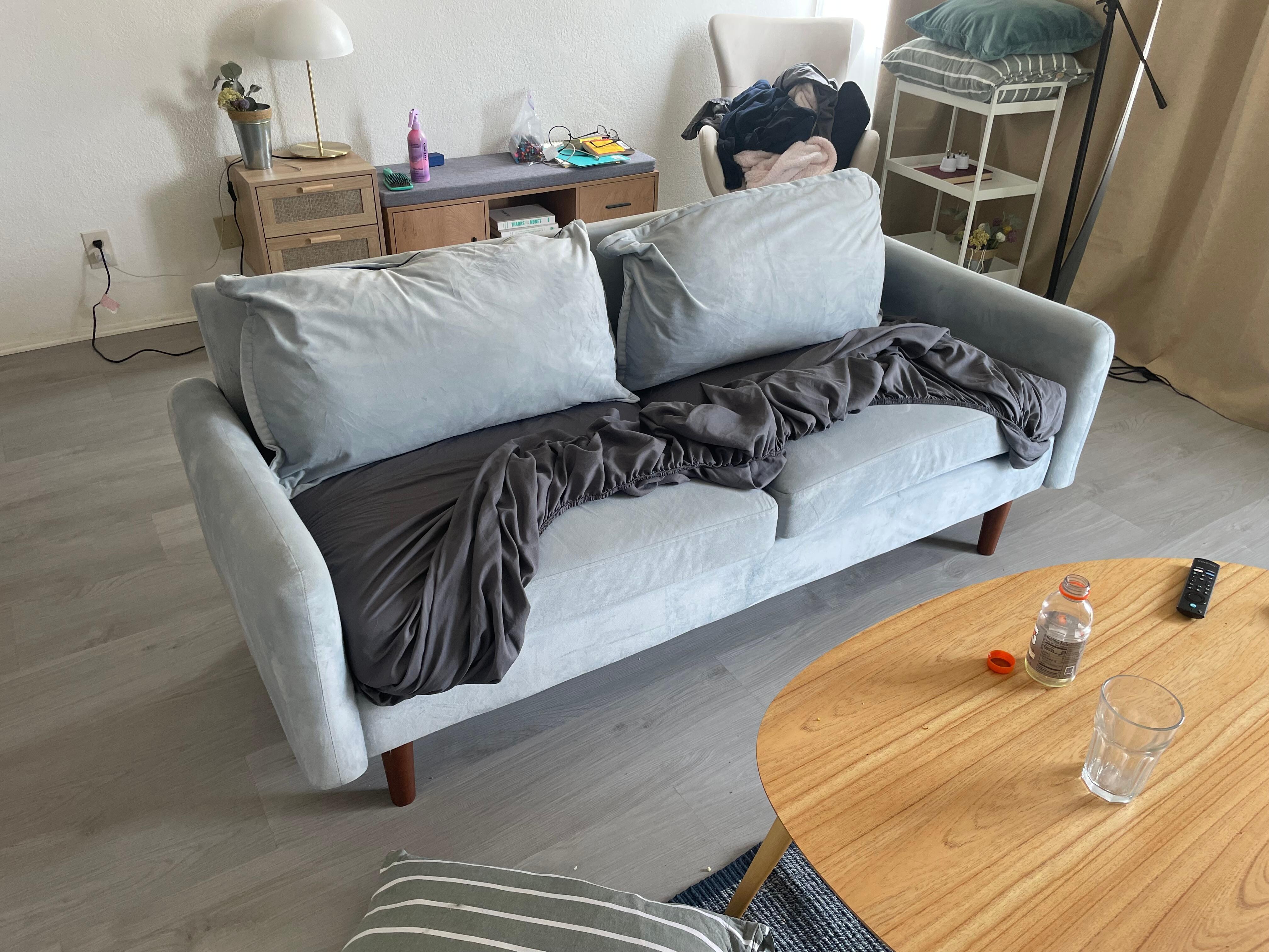 This is NOT a sofa bed. It only accommodates ONE person to sleep.