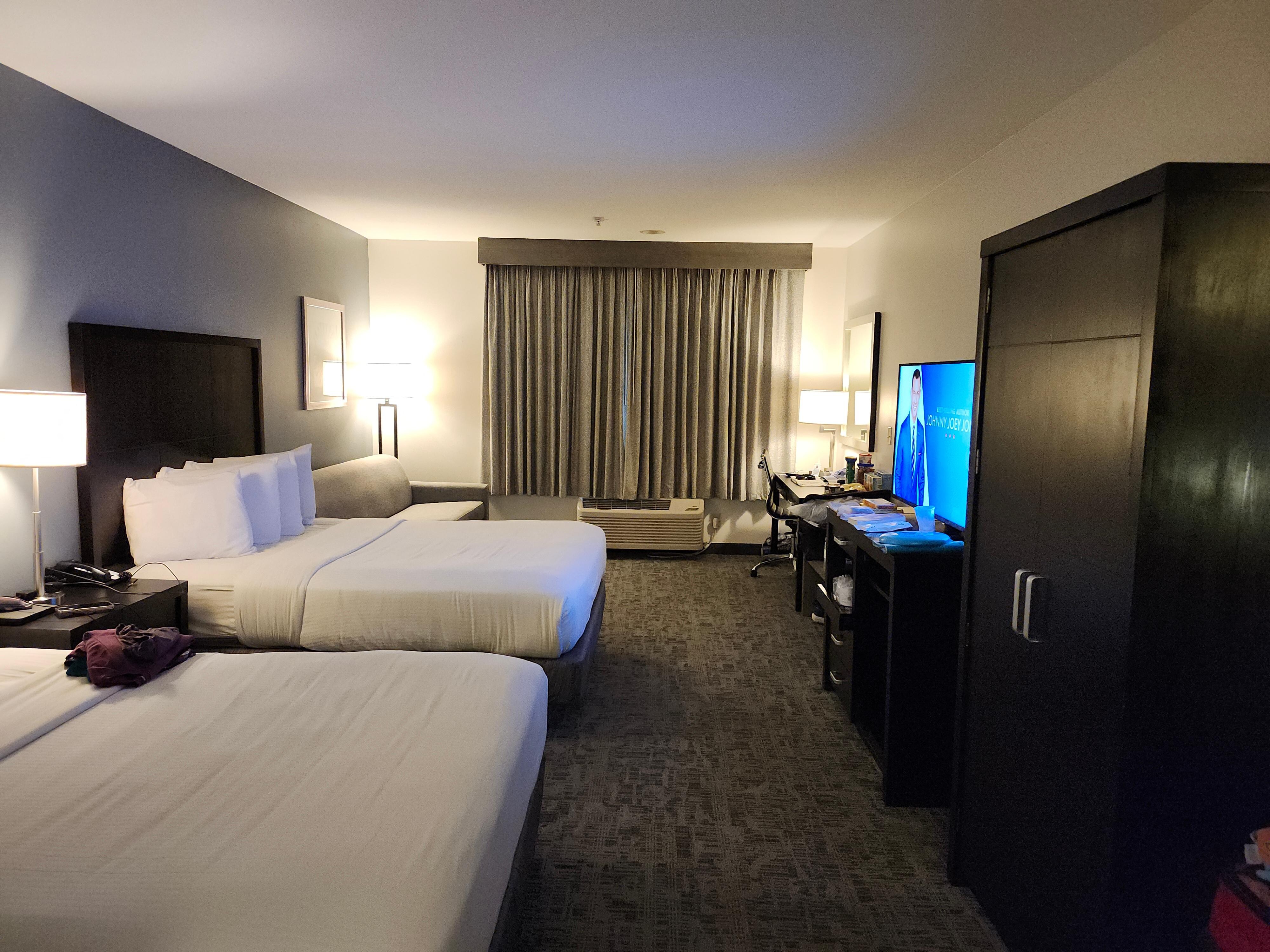 Nice room two beds and couch that made bed