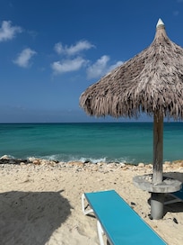 Beach in front of room.