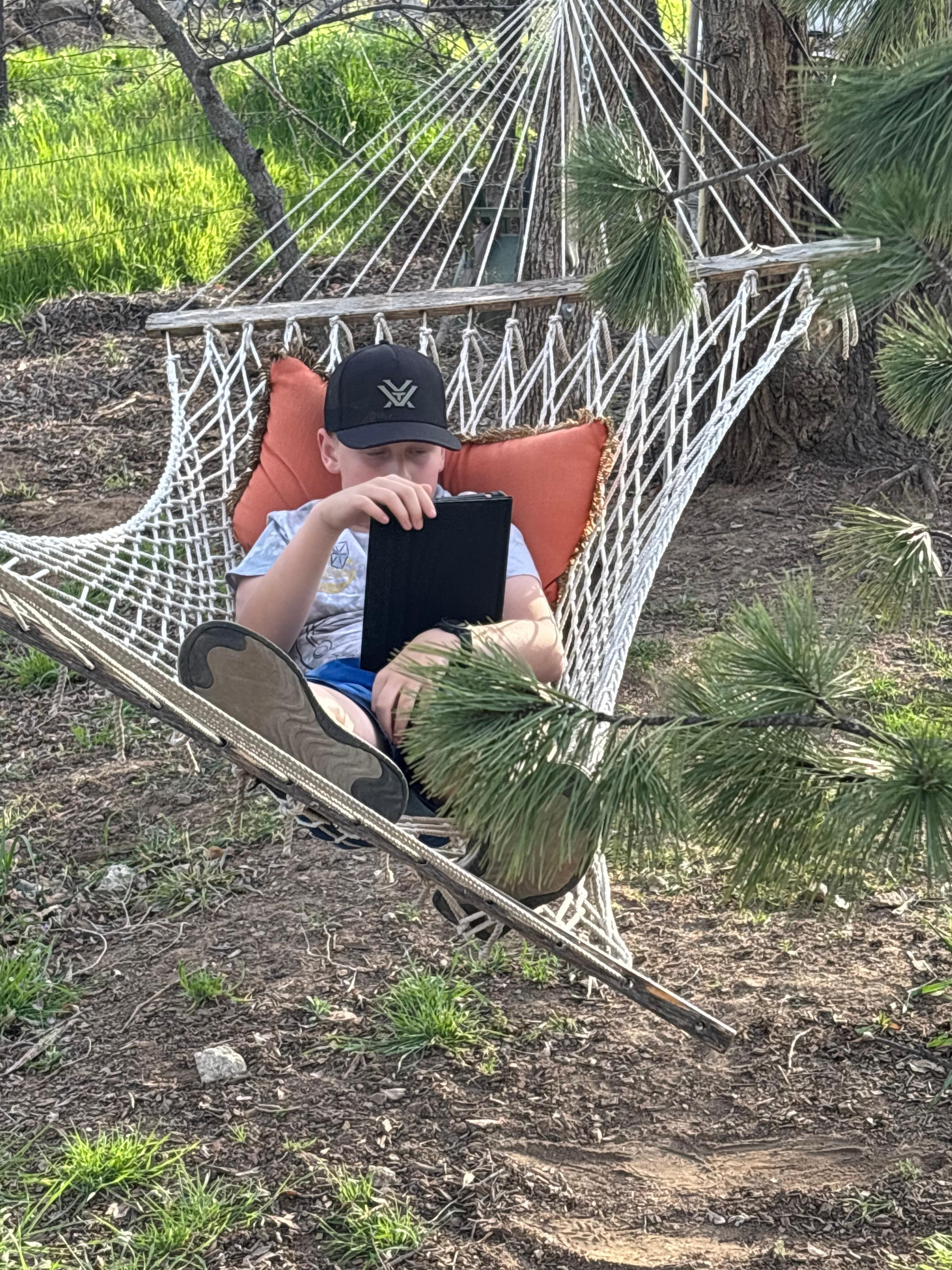 My grandson just loved this hammock n relaxation in the green space n the creekside. 