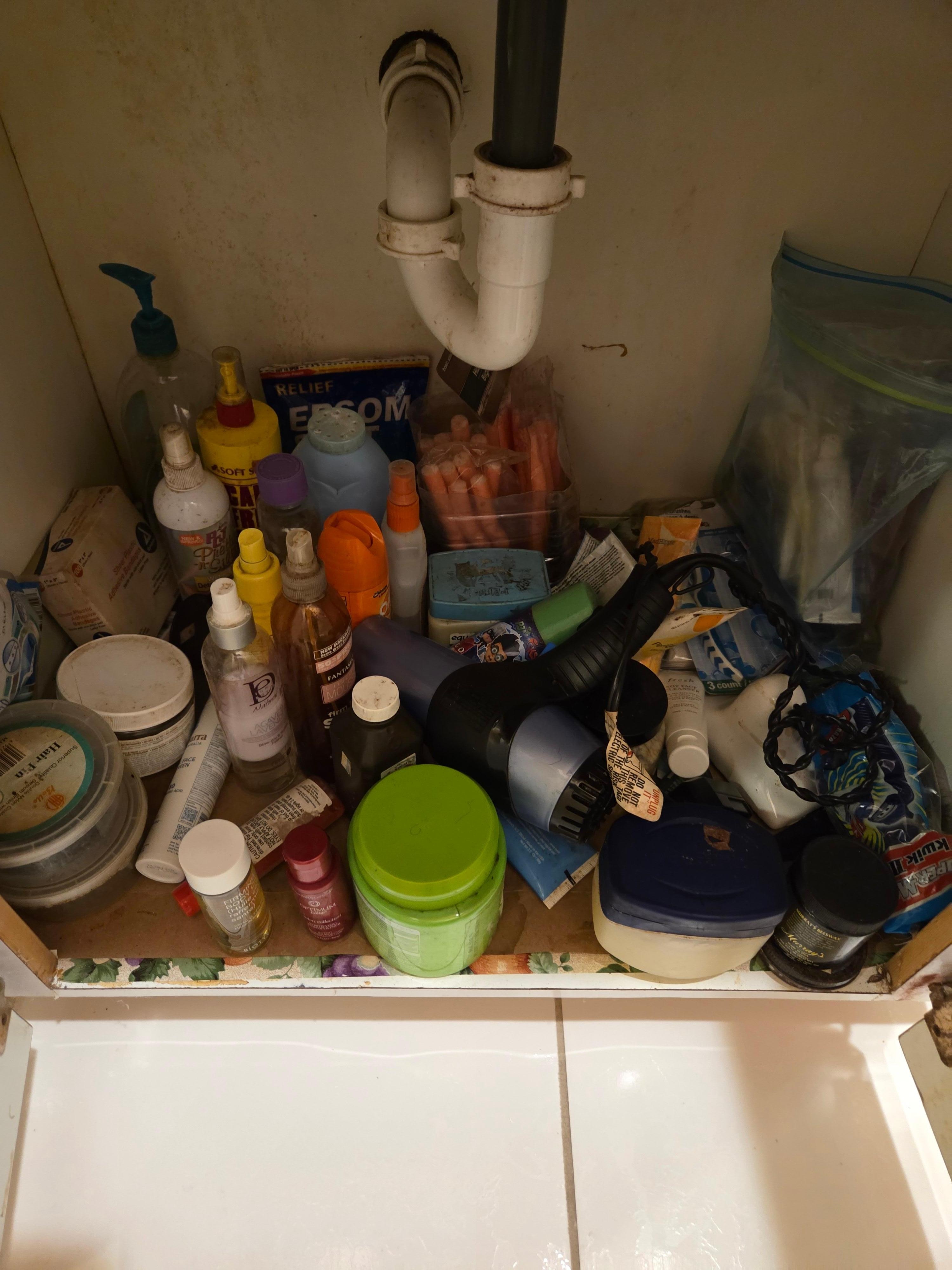 Underneath the bathroom vanity