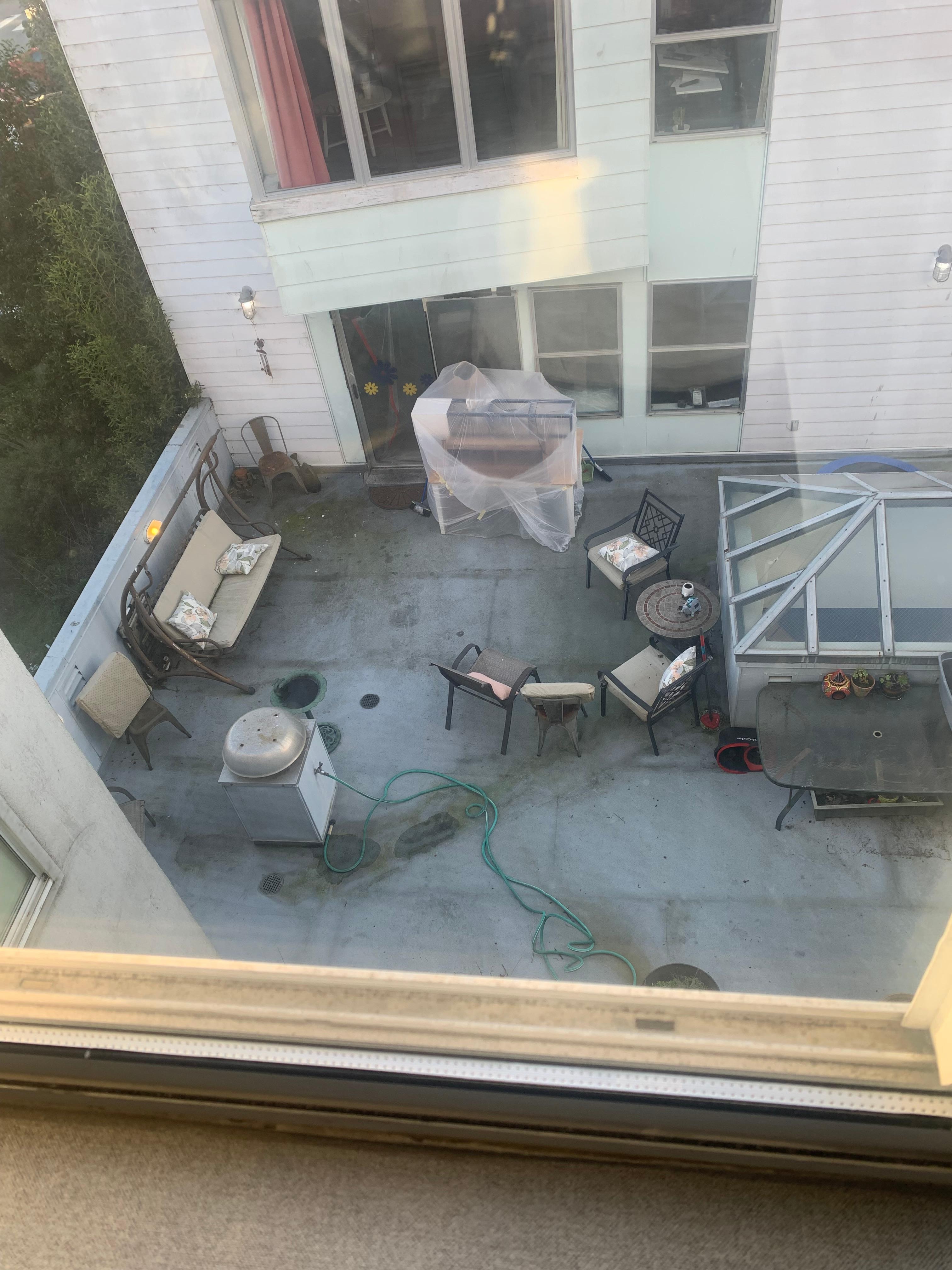 Courtyard of building next door and view from hotel window