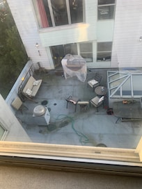 Courtyard of building next door and view from hotel window