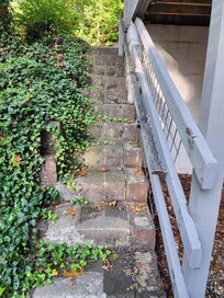 Stairs going up from lower area