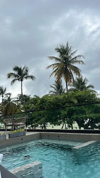 Lying on the pool deck