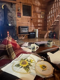 Embroidery by the woodstove