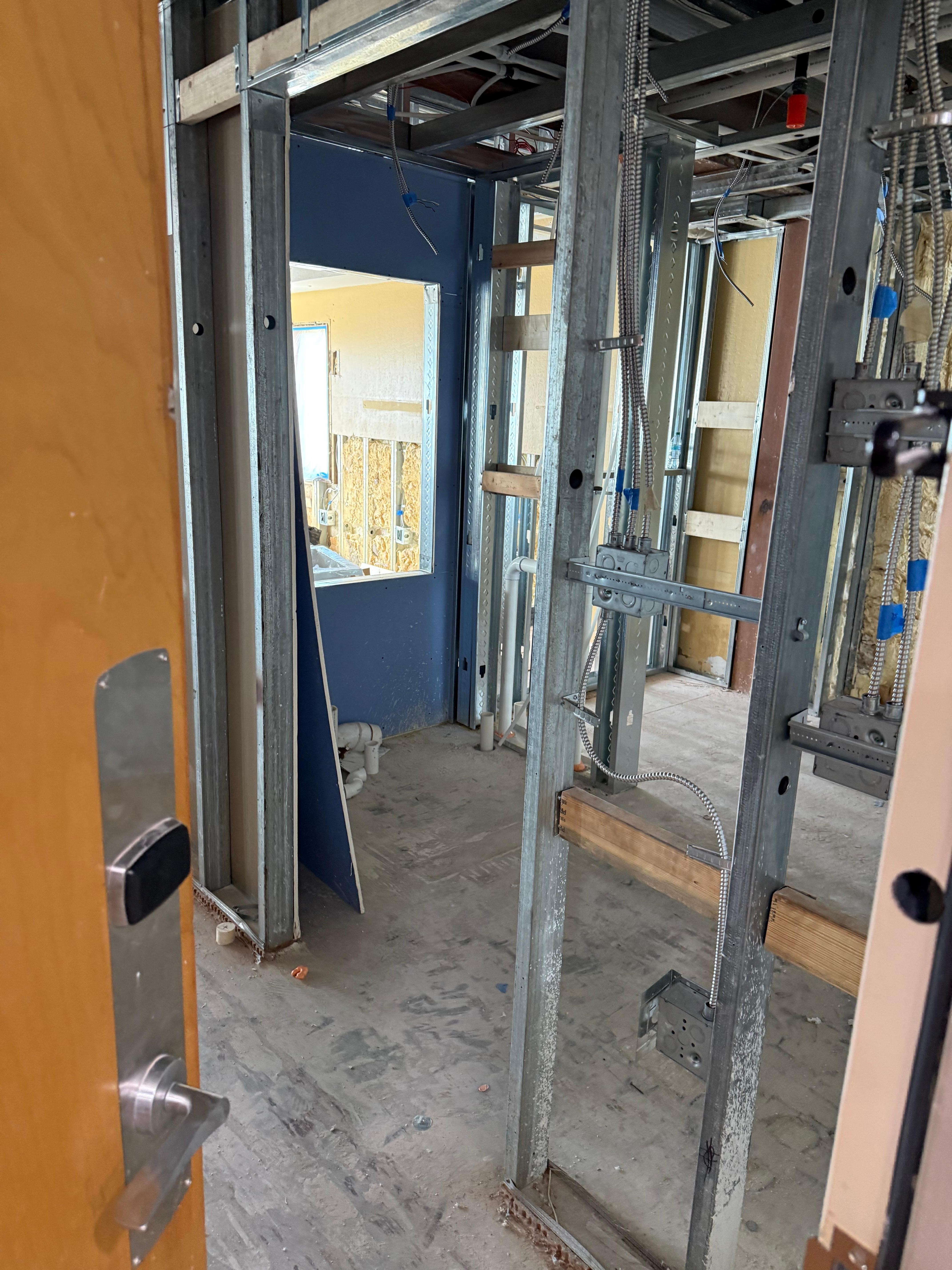 Repairs underway include new drywall 