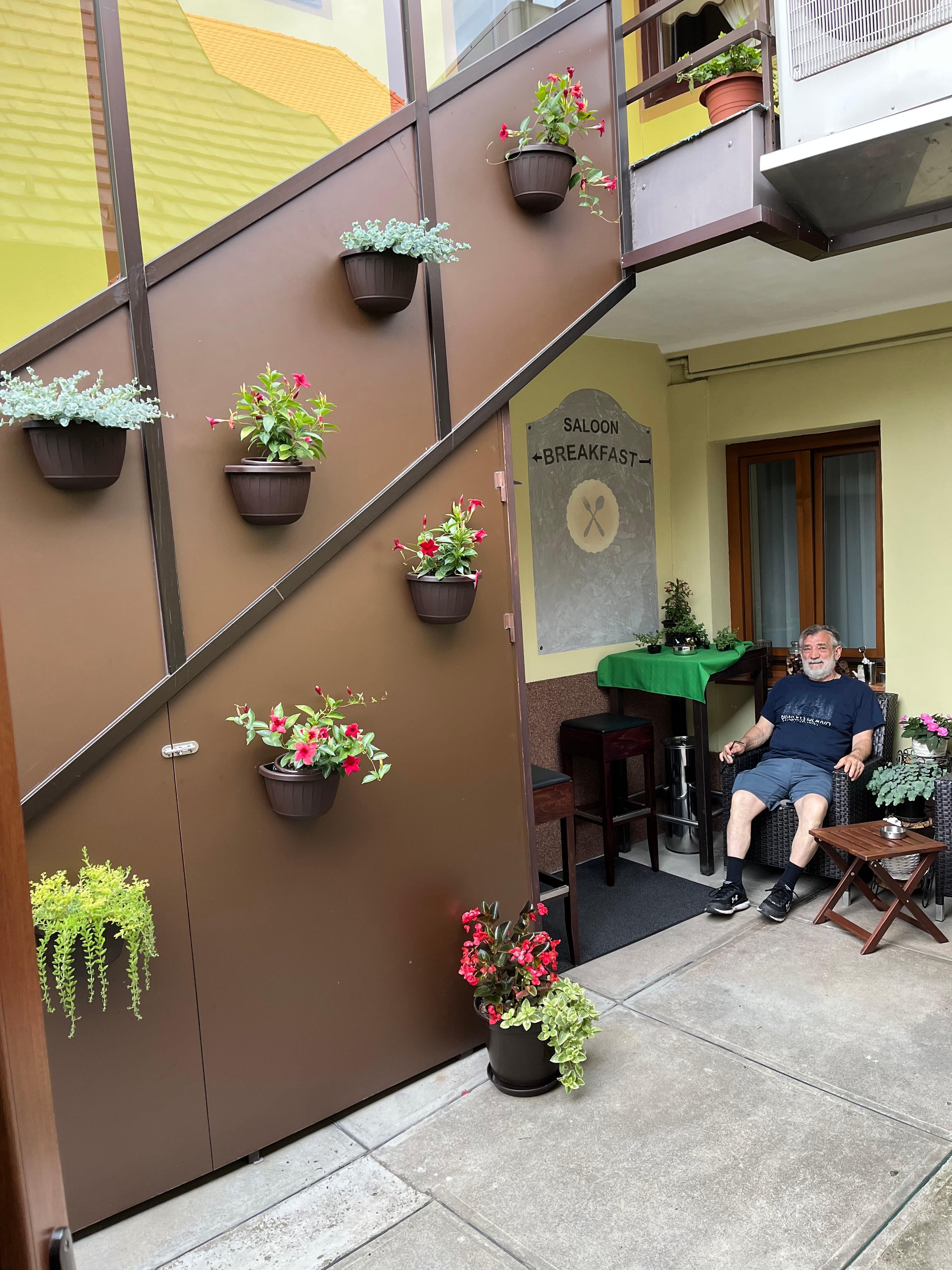 The courtyard outside our room leading to the breakfast area. Wonderful and ample food!