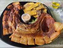 Chuletas cancan (pork chop) with tostones at the Puerto Parguera Restaurant in La Parguera