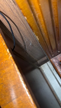 Spiderwebs on the nightstand