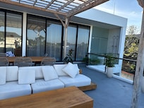 upstairs outdoor area, with outdoor tub