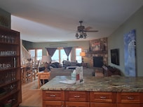 Kitchen looking into main floor living space.