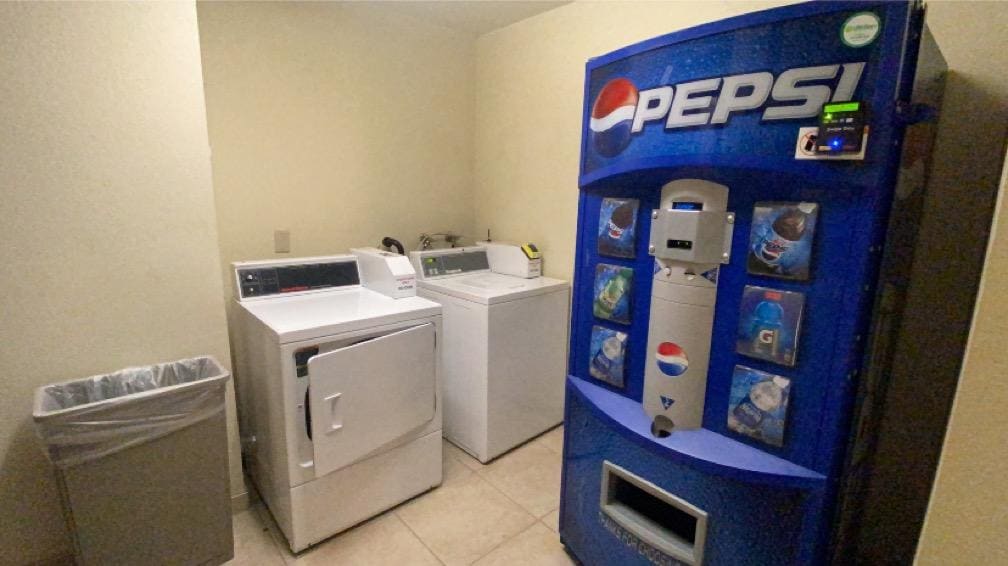 Laundry room with vending machine and ice maker (not shown, but on the left)