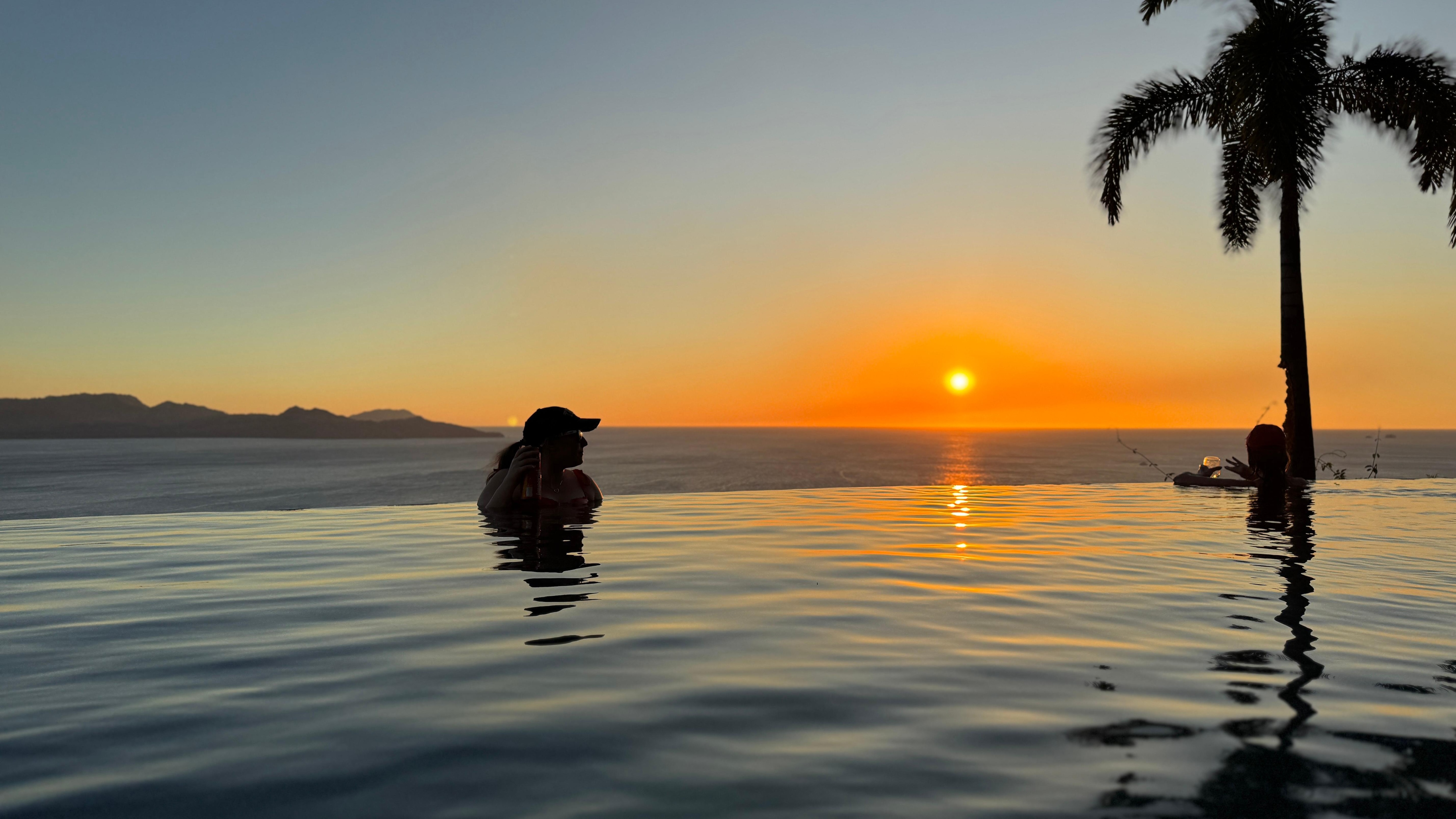 Watching the sunset in the pool.