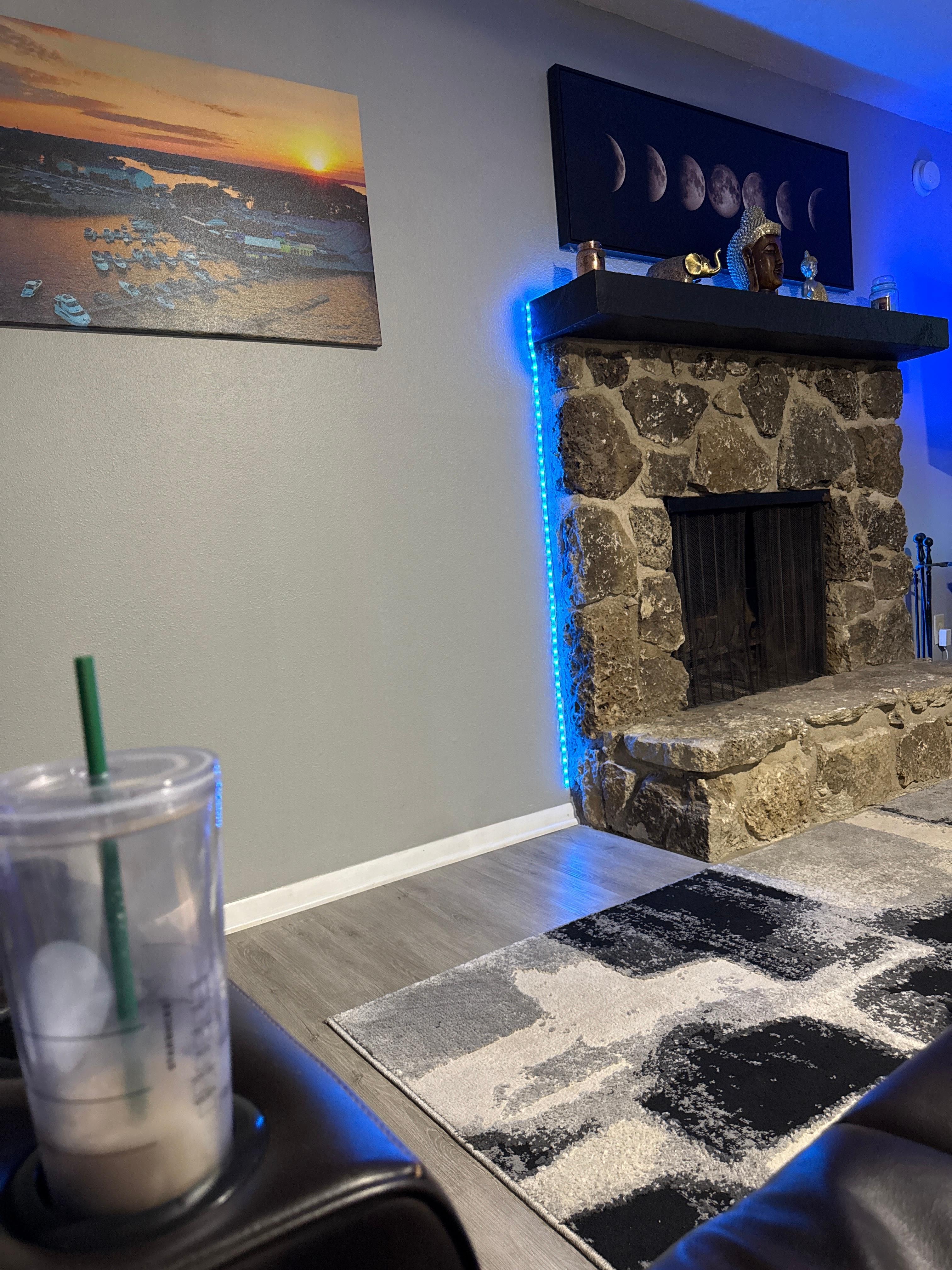 Gorgeous art work, fireplace and lighting. 