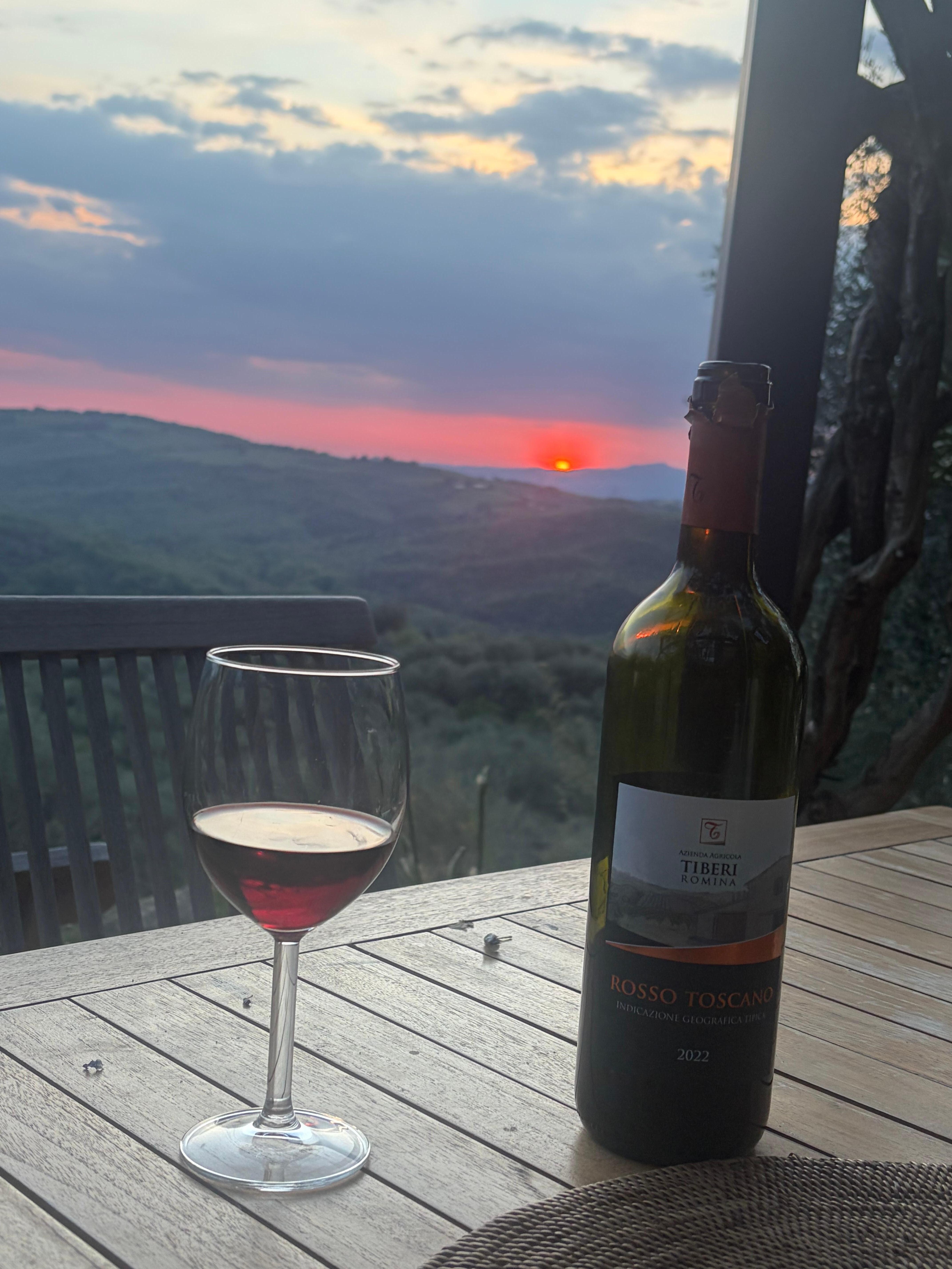 A relaxing glass of wine at sunset