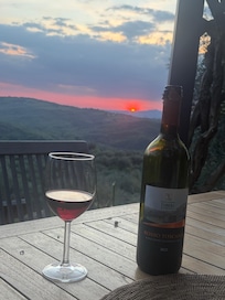 A relaxing glass of wine at sunset