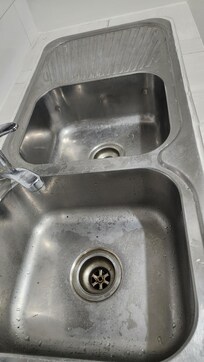 Sink not clean. No dishwashing liquid etc