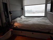 Our bed. I slept next to the window which made getting in and out of bed a little tricky!