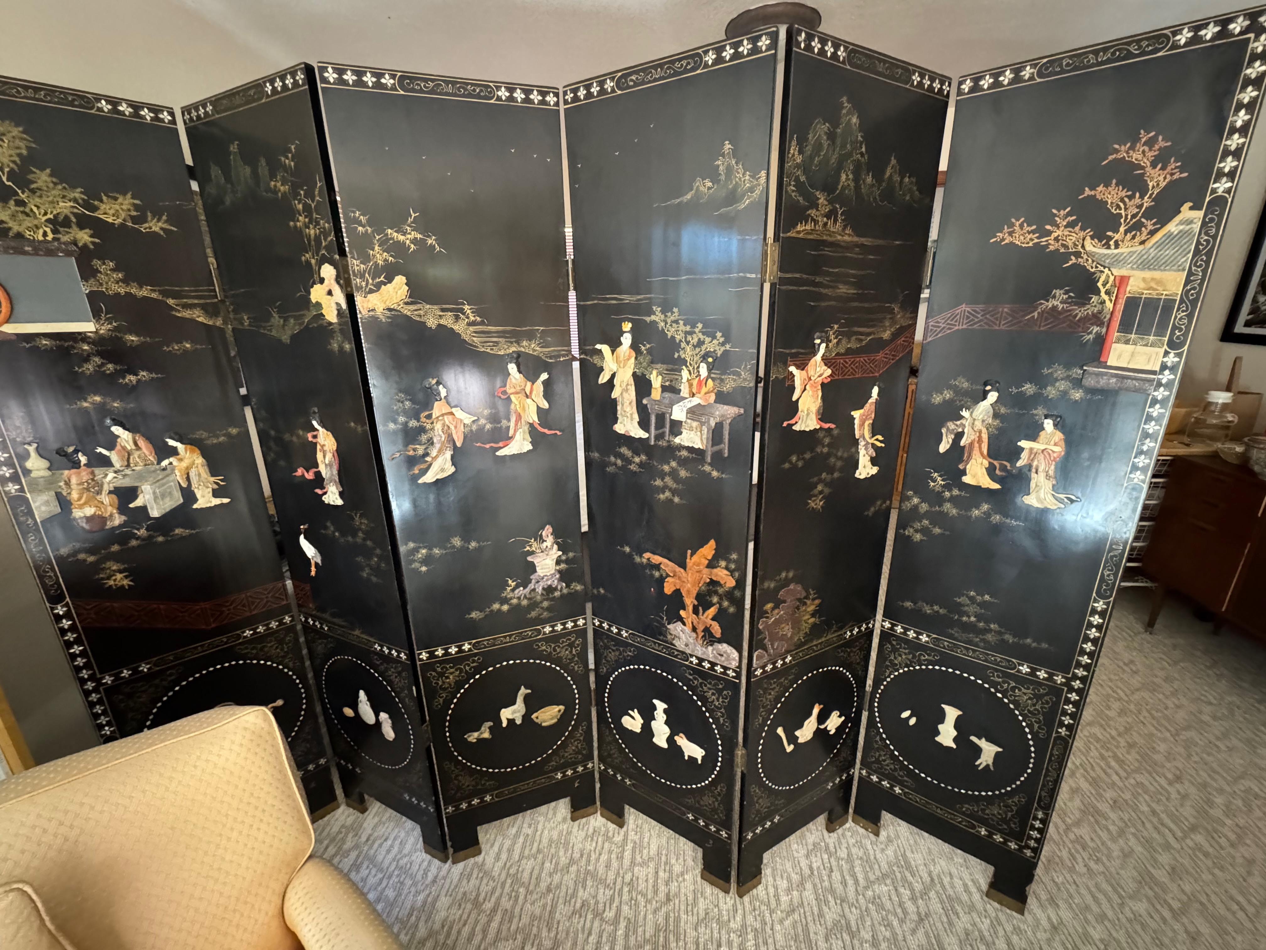 Beautiful screen separating the space into living and bedroom areas