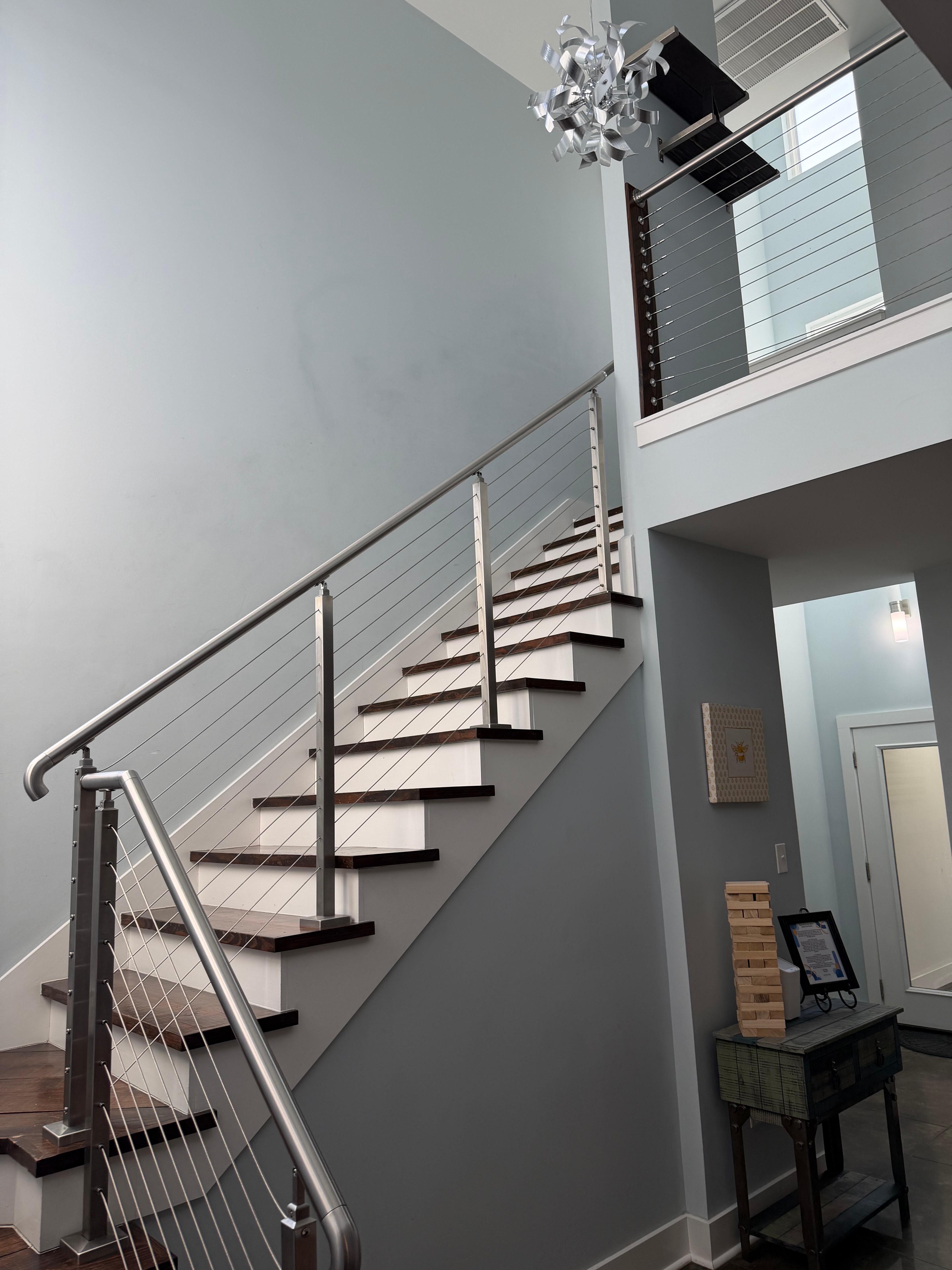 Stairs leading to 2 bedrooms.