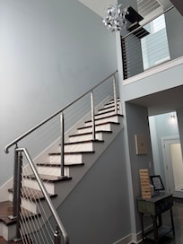 Stairs leading to 2 bedrooms.