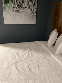 bed looks like someone has been here