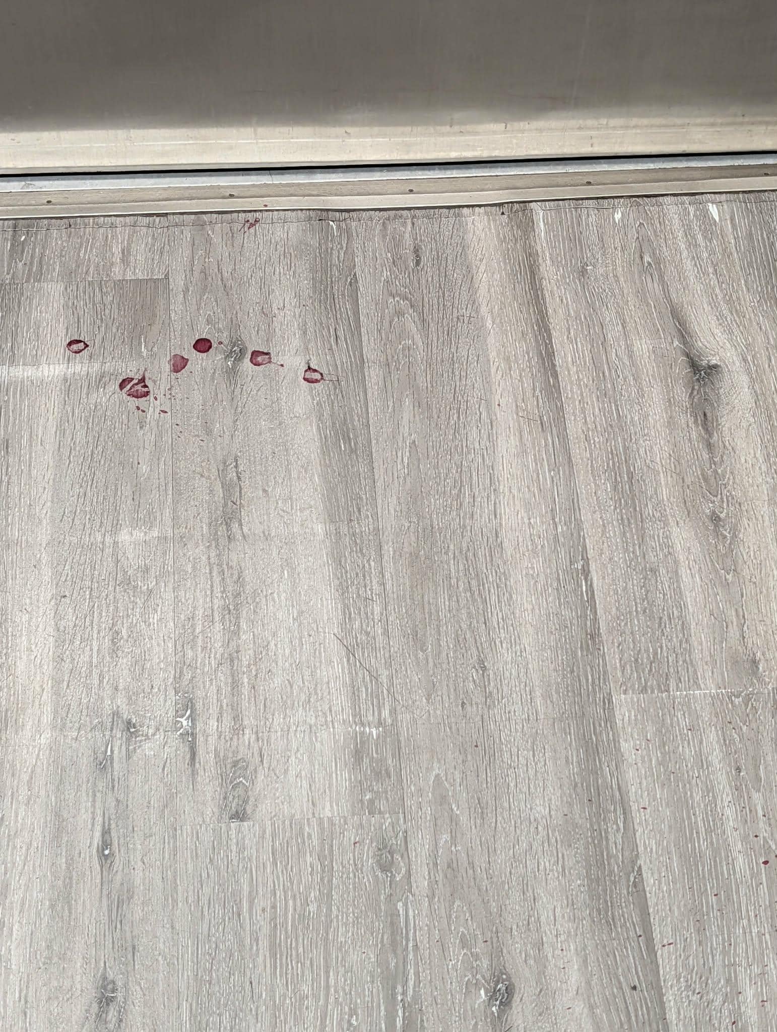 Floor heading to exit door after getting off the elevator to the exit door