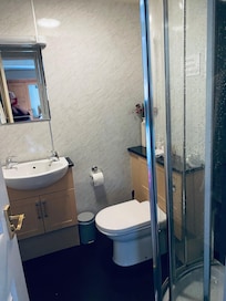 Modern bathroom with plenty of good quality toiletries.