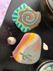 Painted some rocks that we found at the beach