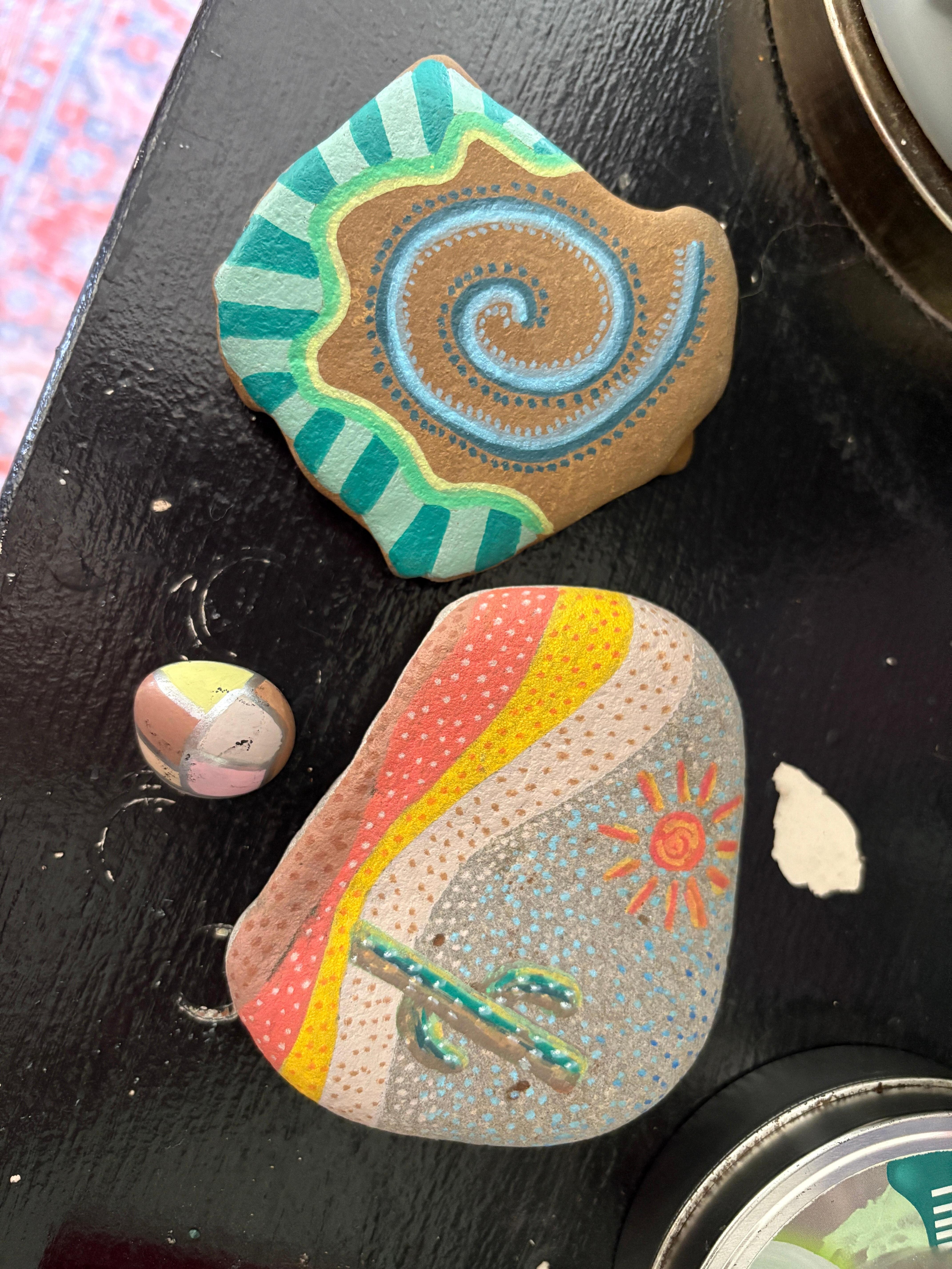 Painted some rocks that we found at the beach 