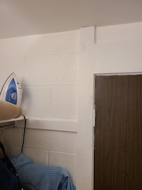 Concrete block walls not covered except with paint