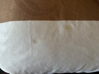 Something spilt on bedspread