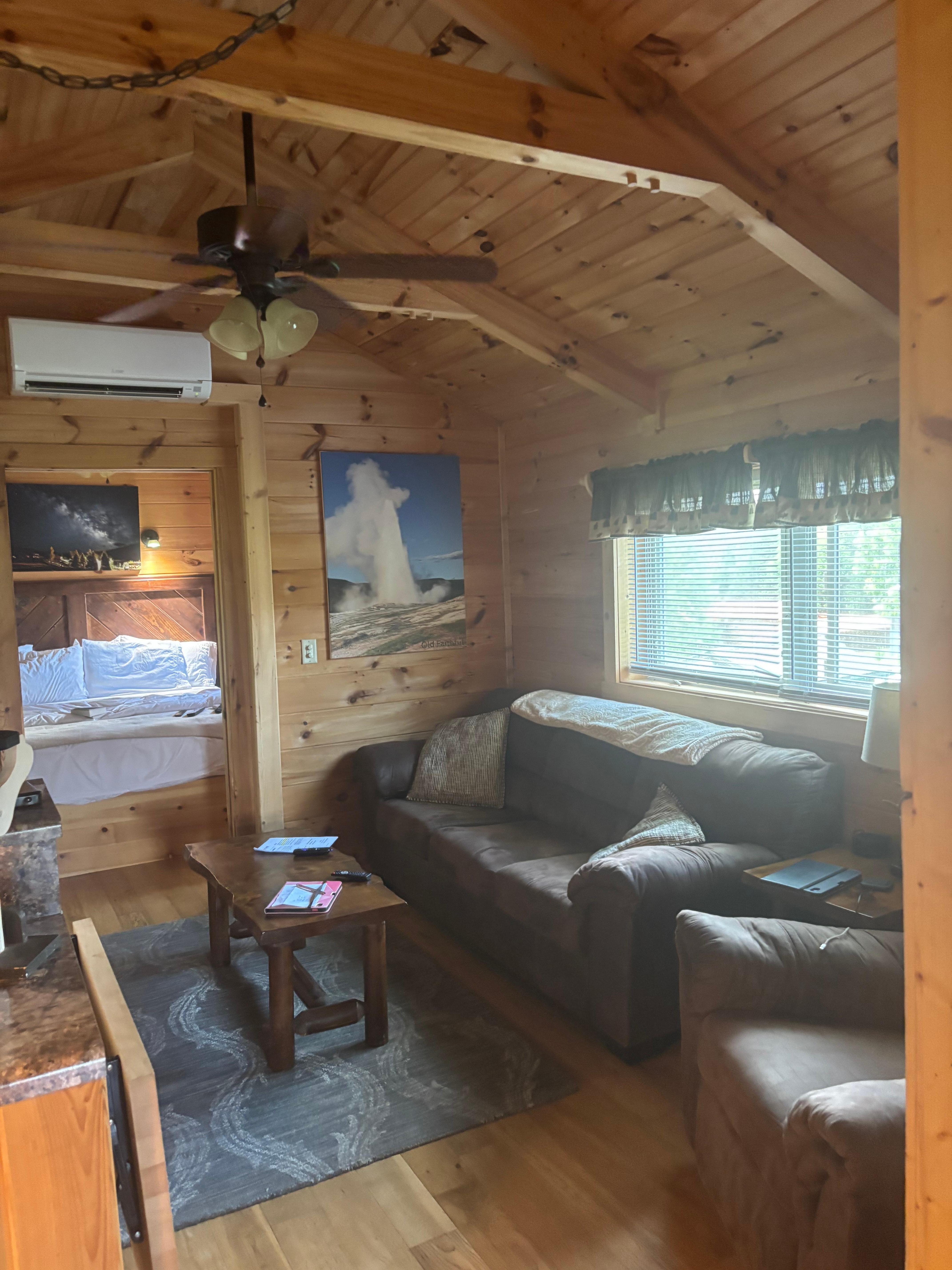Living room with comfortable pull out sofa and recliner , leads too door to bed room with comfortable king size bed and another tv . Closet and drawer space . 👍