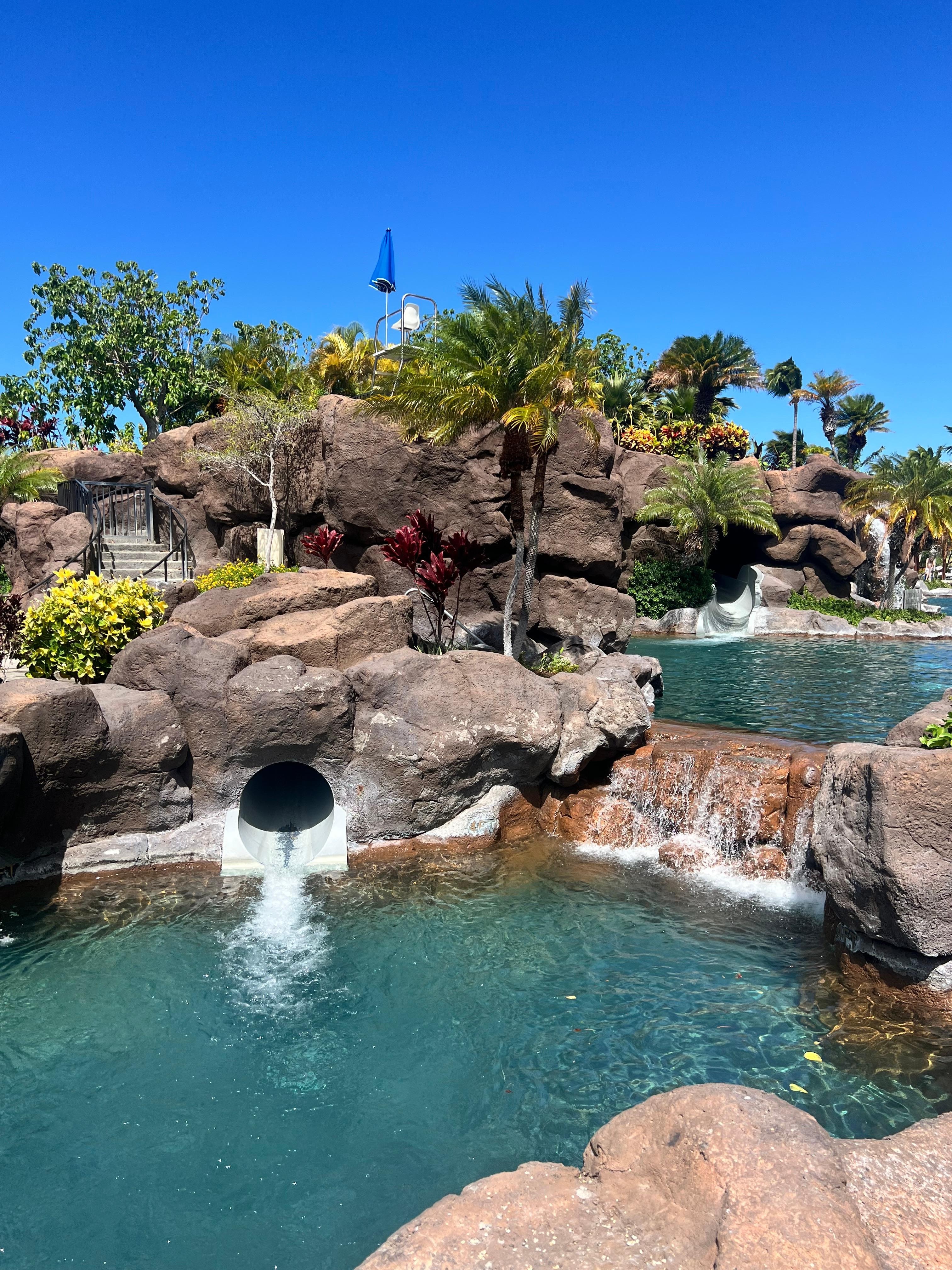 Main pool with 3 waterslides, plus one mini one in the kids area