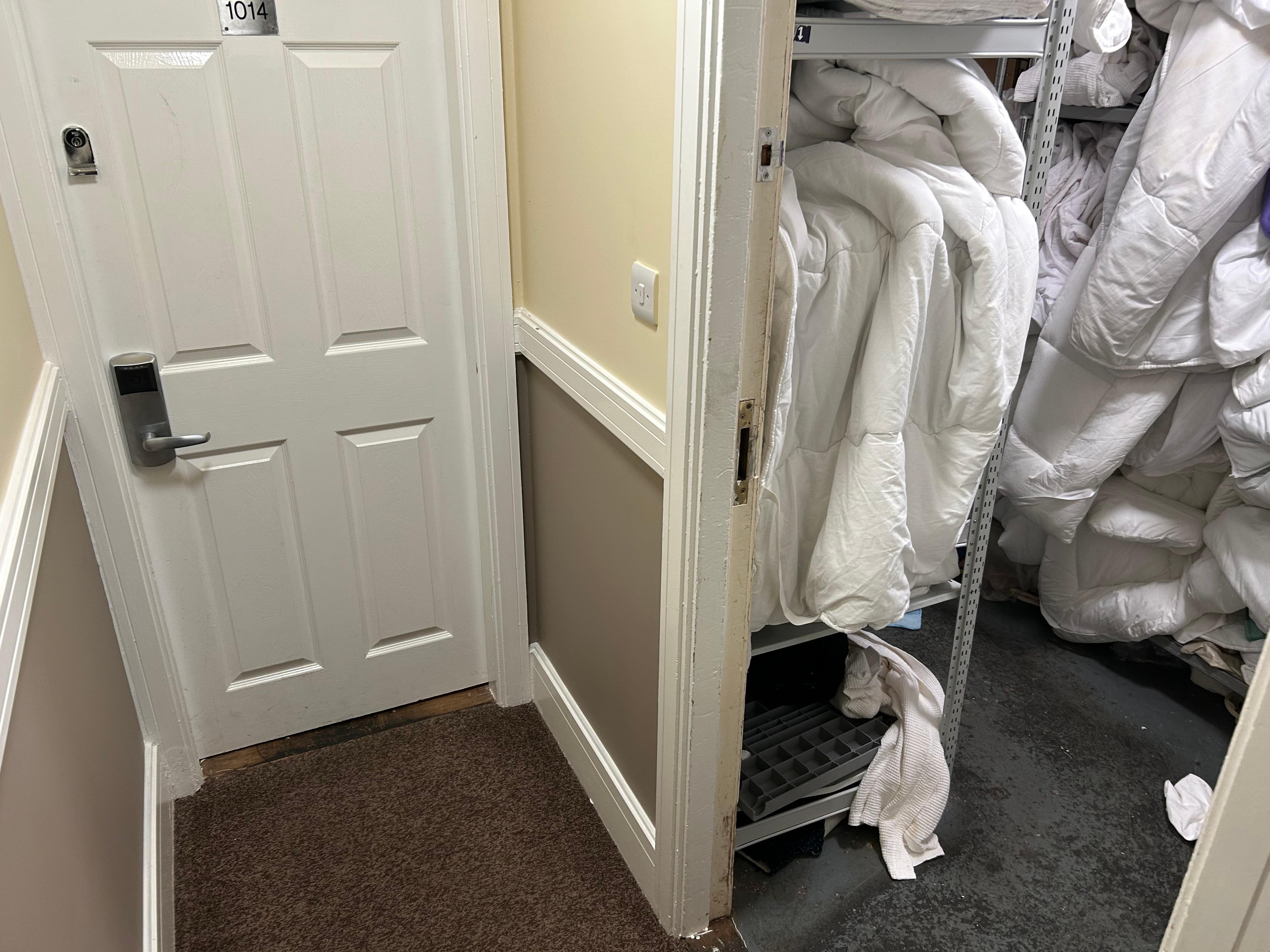 A cupboard left open next our room.