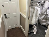 A cupboard left open next our room.