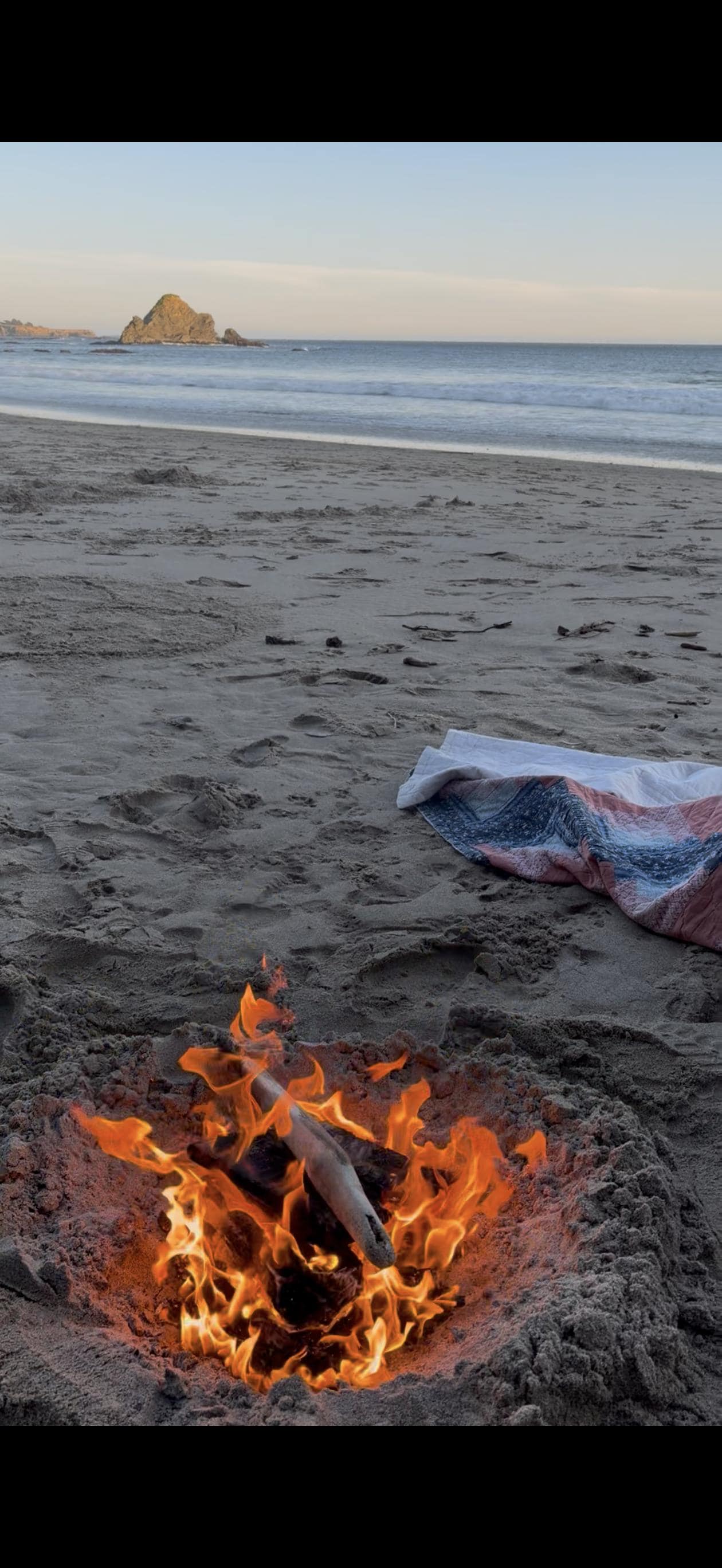 Fire on the beach just below the property! 