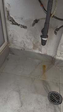 moldy restroom in bad state of disrepair