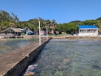 Dive shop is next door with a bar/restaurant. Good burgers.