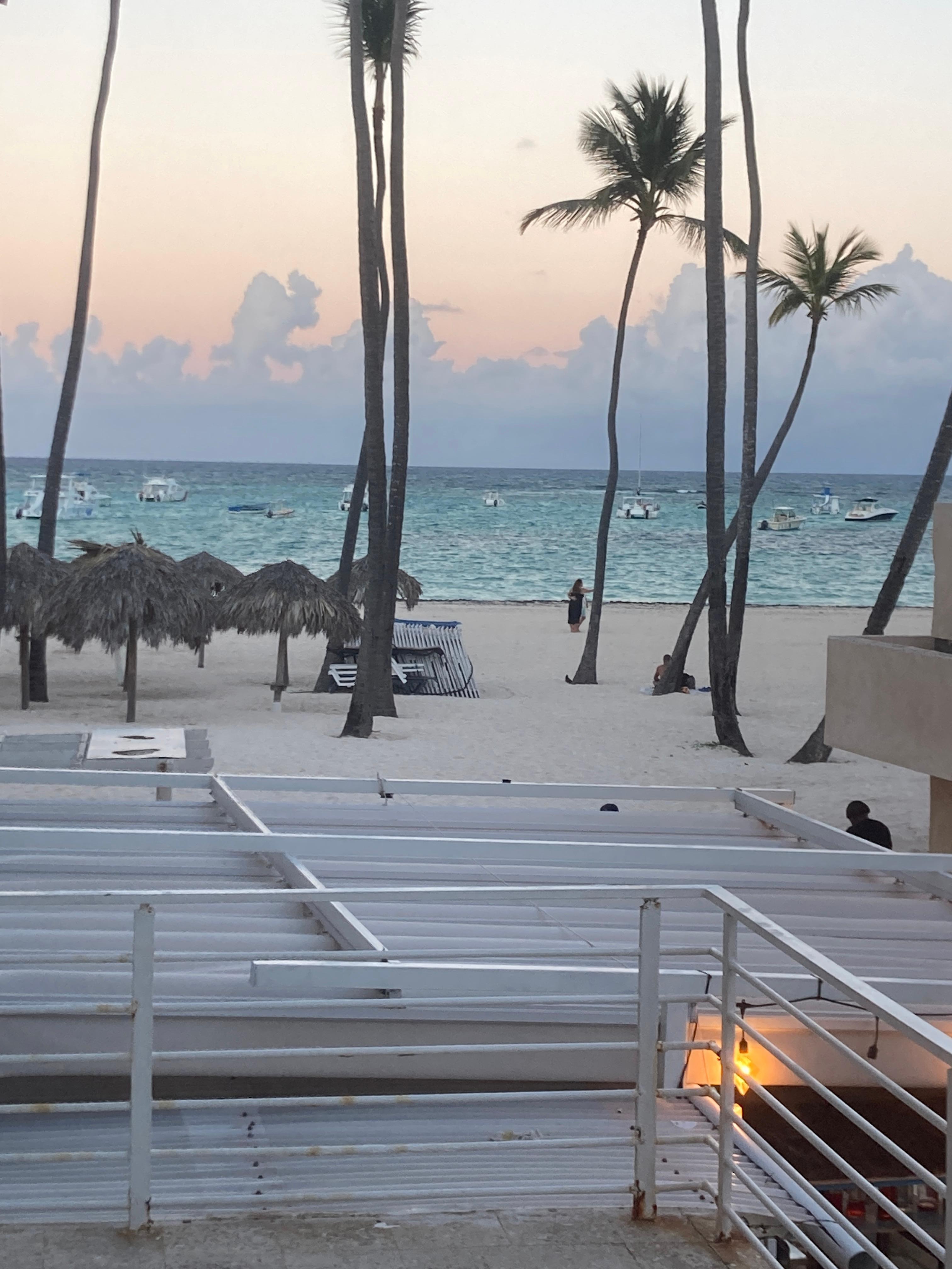 View of the beach from the balcony of the apartment.