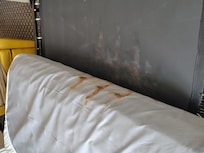 This is pull out couch bed out something really nasty on it could not move rooms