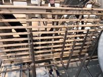 Silverware basket in dishwasher covered in mold and mildew