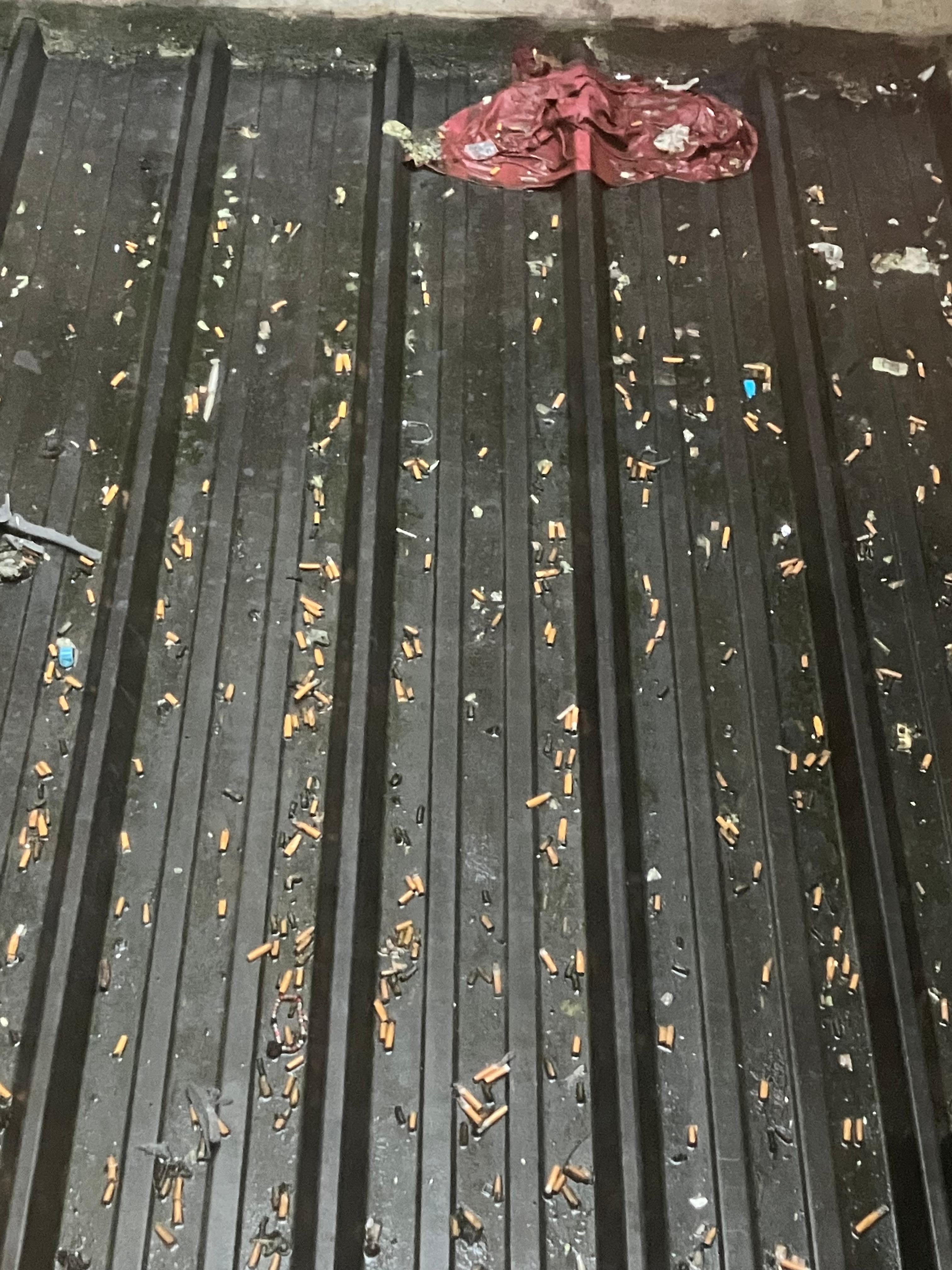 The two windows of this apartment open to this interior courtyard. It’s a virtual ashtray although this property has an expressed no smoking policy.