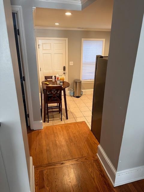 Picture taken from the main floor living room.  One step down to landing, then another 2 steps into the kitchen.  Stabilizers include appliance, wall corner, and chair back to make it down safely.