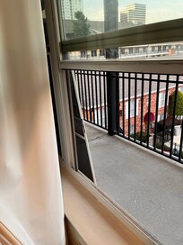 Had to climb on table, remove screen and jump onto walkway. None were easy at age 68.