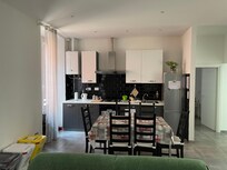 Kitchen area. Pretty much everything you need. Dishes, utensils, refrigerator, etc.