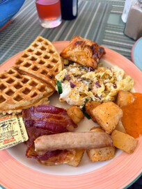 Breakfast. Freshly made waffle and made to order scrambled eggs